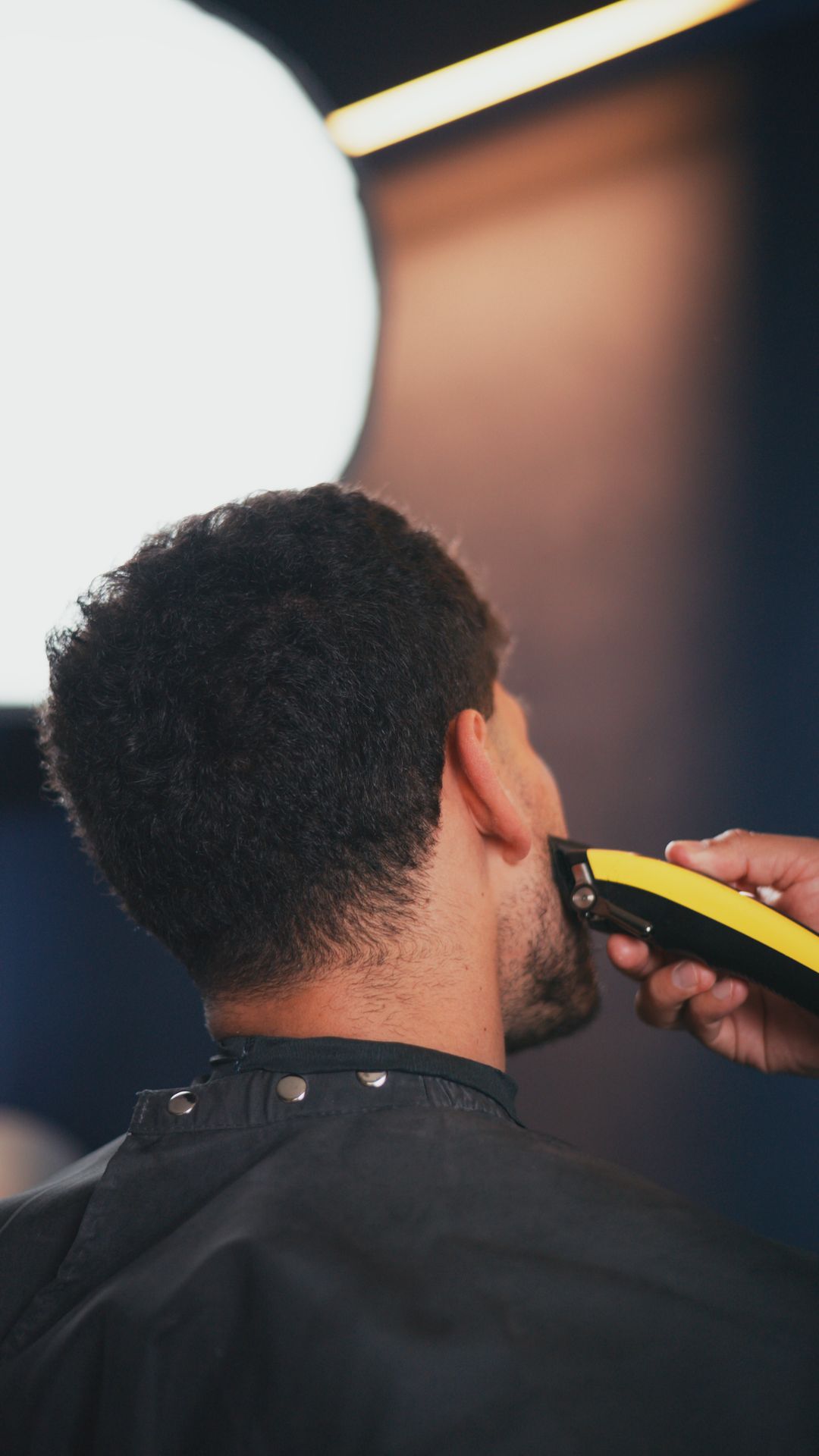 Degradado en la nuca trabajado a máquina en PULSO Barber Studios